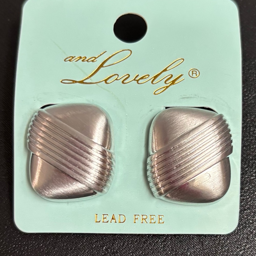 5/$25 (Pick 5 items for $25 labeled)
and Lovely Silvertone Clip On Earrings